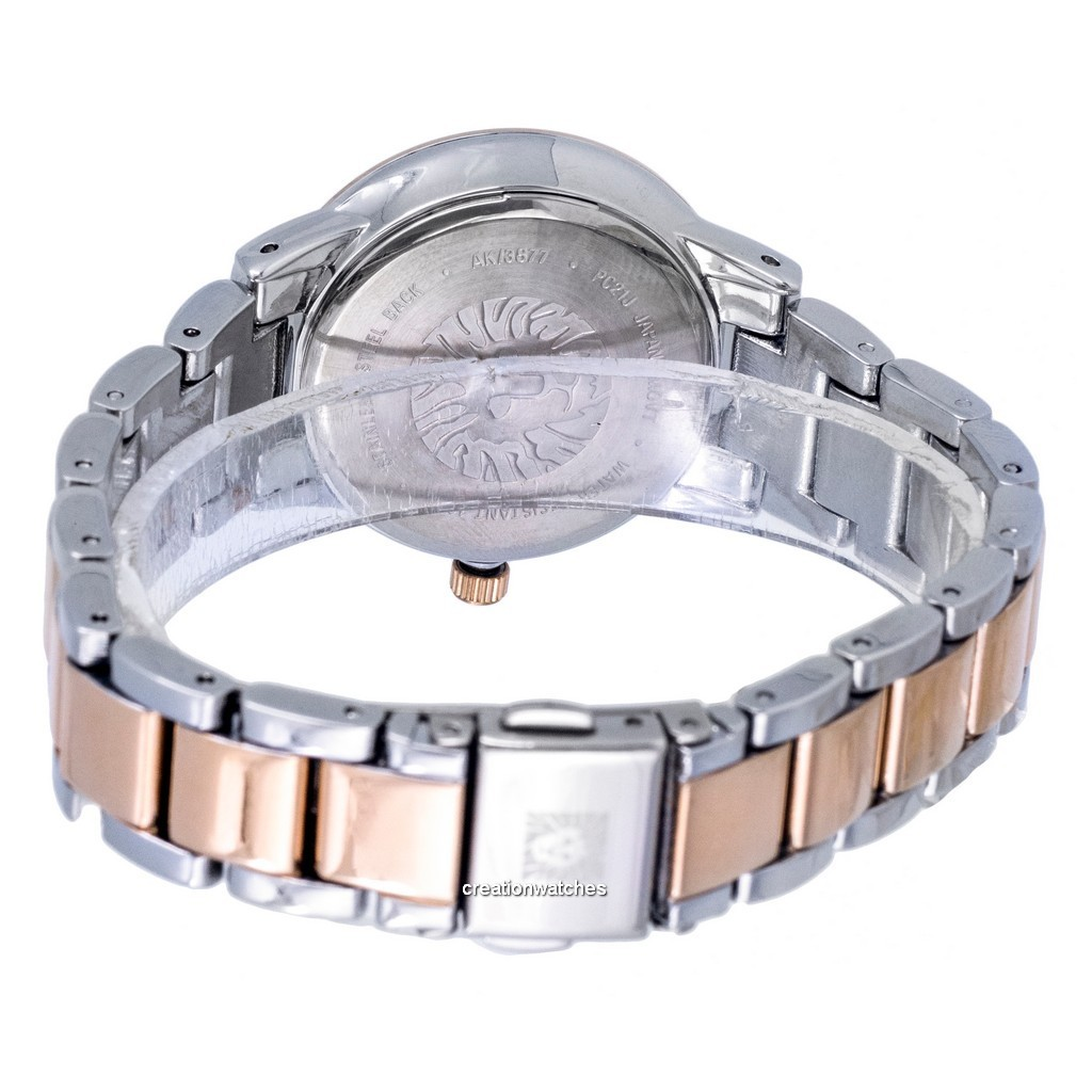 Reloj Anne Klein de dos tonos de acero inoxidable con esfera blanca y cuarzo 3877SVRT para mujer.